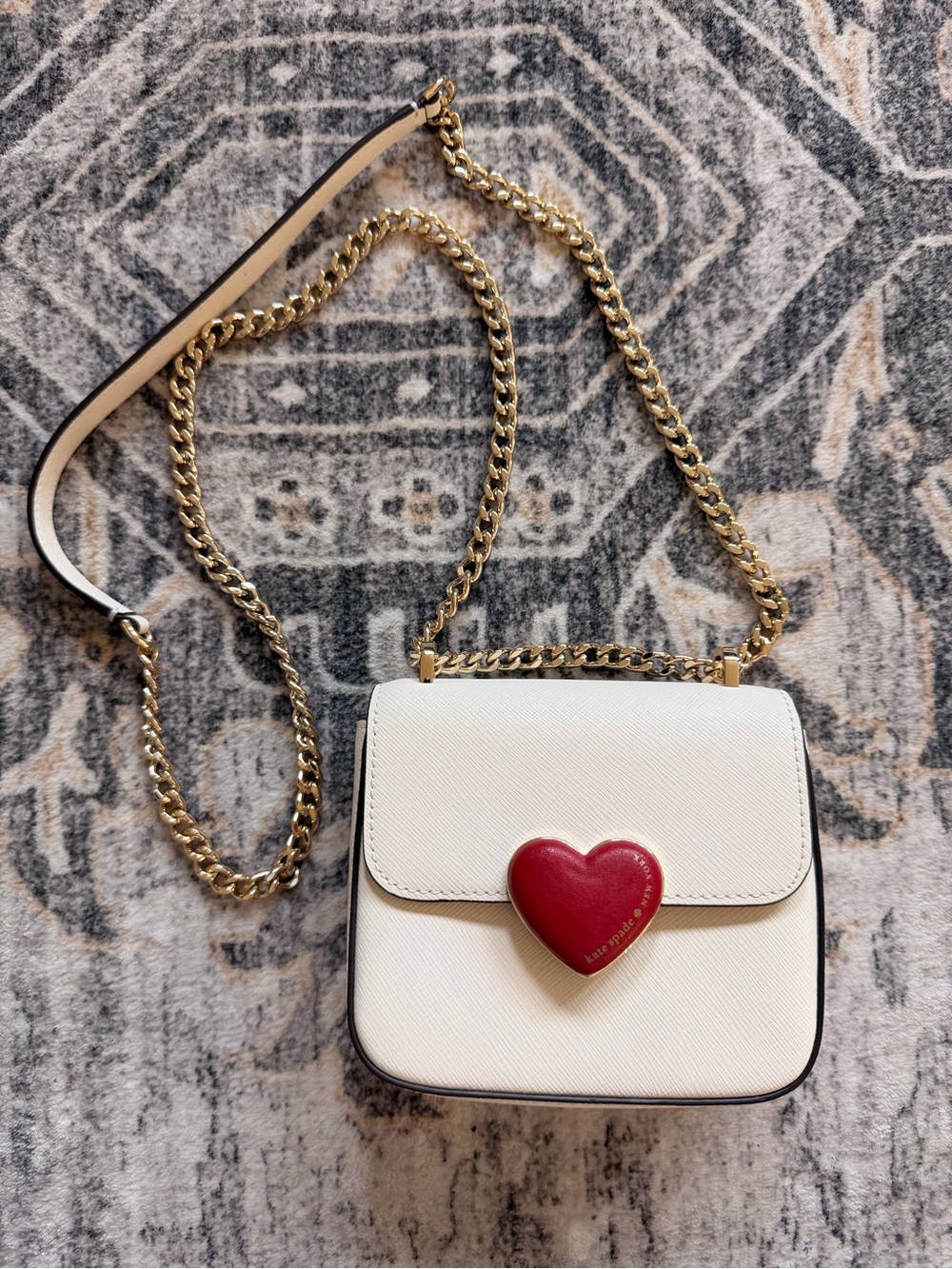 Kate Spade Meringue Colored Micro Flap Bag with Heart Hardware and Gold Chain